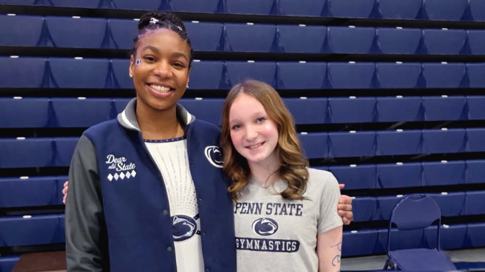 Maddie and her mentor Ava, a Penn State gymnast, meeting in person